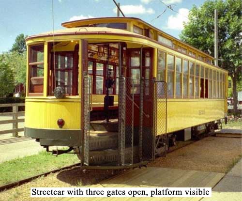Streetcar with three gates open, platform visible