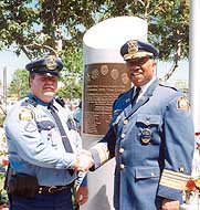 Photo of Tim Bradley with Chief William Finney in front of the time capsule